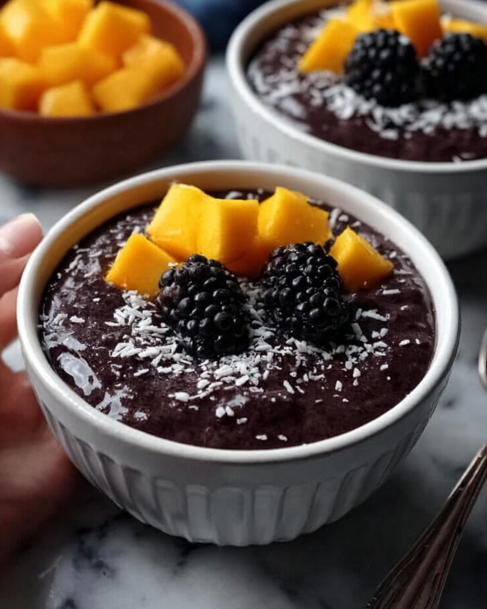 Thai Black Sticky Rice Pudding with Coconut Sauce and Mango Topping Recipe - Recipe Image